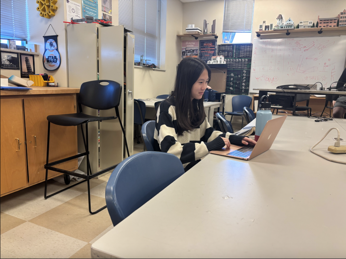 9:30 a.m.
Sophomore Megan Tai codes a game for her AP Computer Science project. The game Tai created allows the user to play a would you rather scenario. “My friend Mai came up with the idea, and now we’re applying what we’ve learned to make it,” Tai said. “It’s challenging to meet the requirements and apply the code.”
